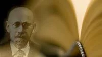 Portrait von Janus Korczak und einem aufgeschlagenen Buch