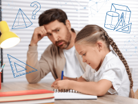 Vater lernt mit seiner Tochter am Schreibtisch für den Geometrieunterricht